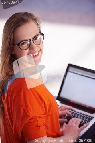 Image of student girl with laptop computer