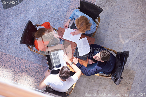Image of students group working on school  project  together