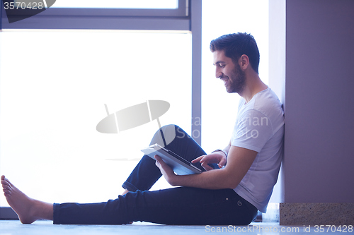 Image of student working on tablet