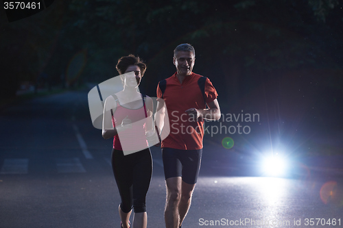 Image of couple jogging at early morning