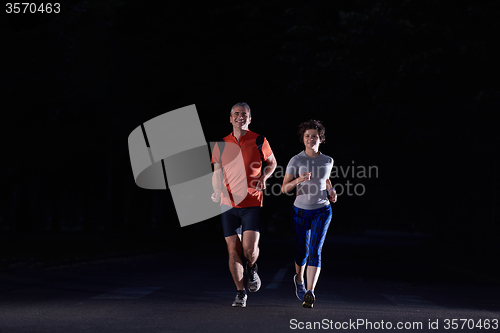 Image of couple jogging at early morning