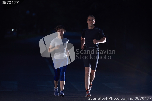 Image of couple jogging at early morning