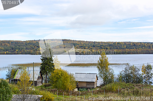 Image of Rural houses on lakeside in taiga
