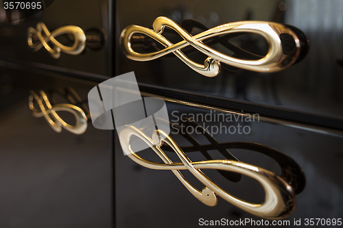 Image of gold furniture handles