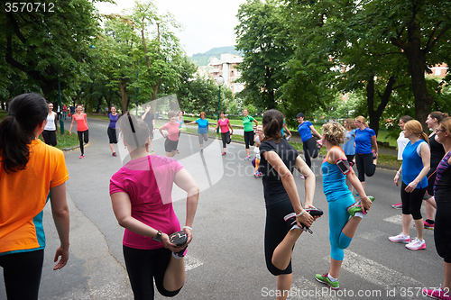 Image of jogging people group stretching