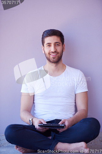 Image of student working on tablet