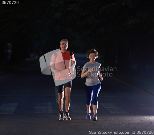 Image of couple jogging at early morning