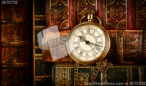 Image of Old Books and Vintage pocket watch