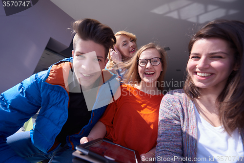 Image of students group working on school  project  together