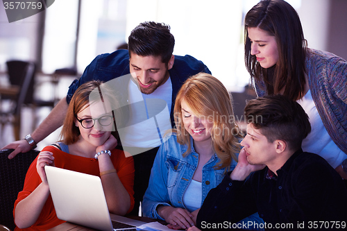 Image of students group working on school  project  together