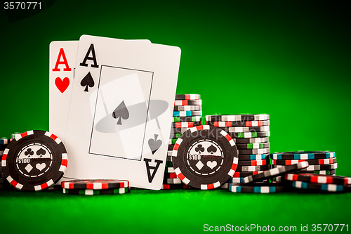 Image of chips and two aces