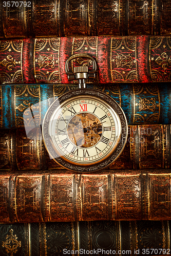 Image of Old Books and Vintage pocket watch