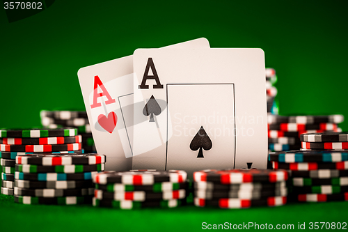 Image of chips and two aces