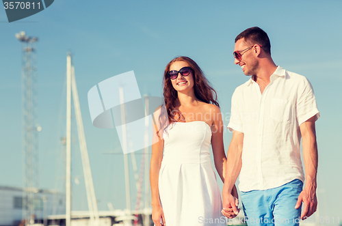 Image of smiling couple in city