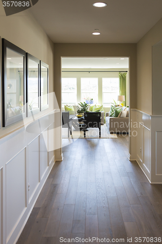 Image of Home Entry Way with Wood Floors and Wainscoting