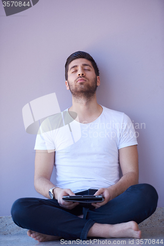 Image of student working on tablet