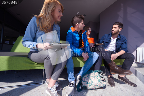 Image of students group working on school  project  together