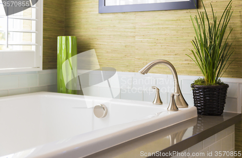 Image of New Modern Bathtub, Faucet and Subway Tiles