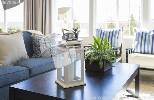 Image of Living Area with Coffee Table, Couch and Chairs