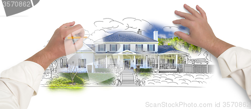 Image of Male Hands Sketching House with Photo Showing Through