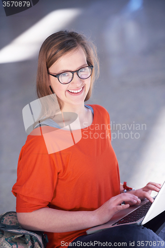 Image of student girl with laptop computer