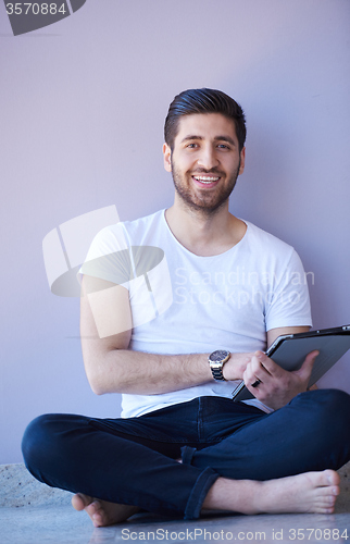 Image of student working on tablet