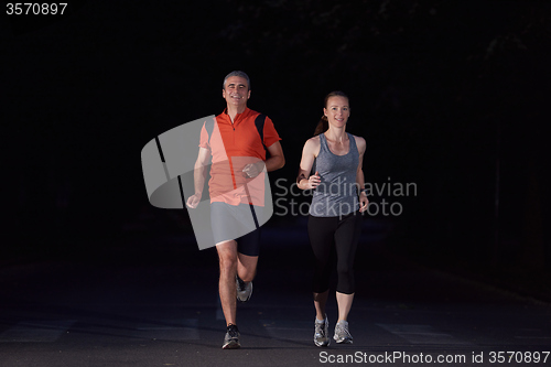 Image of couple jogging at early morning
