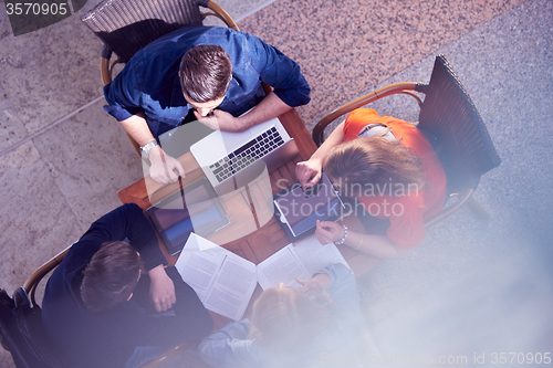 Image of students group working on school  project  together