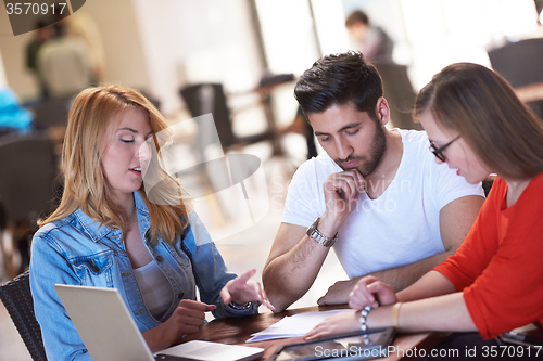 Image of students group working on school  project  together