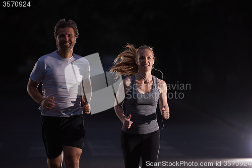 Image of couple jogging at early morning