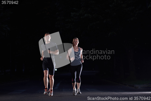 Image of couple jogging at early morning