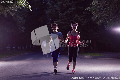 Image of couple jogging at early morning