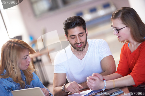 Image of students group working on school  project  together