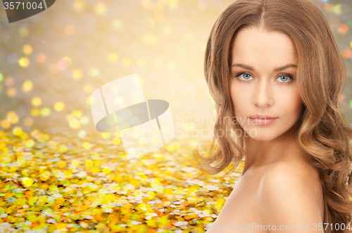 Image of face of beautiful young happy woman with long hair