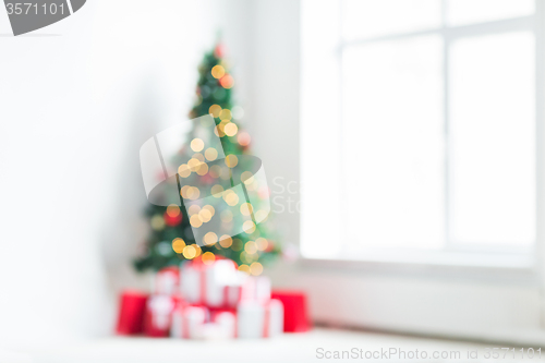 Image of room with christmas tree and presents background