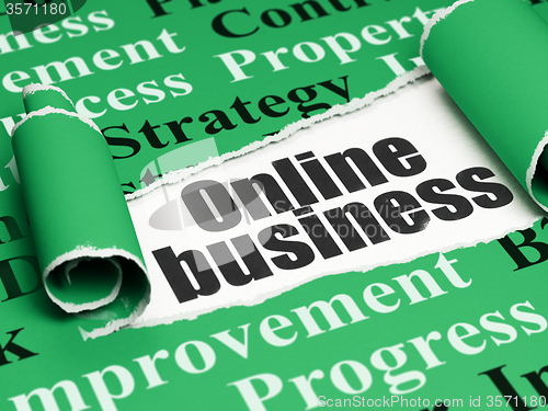 Image of Finance concept: black text Online Business under the piece of  torn paper