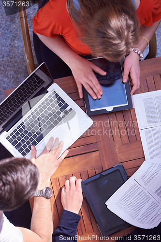 Image of students group working on school  project  together