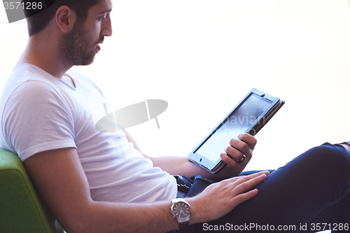 Image of student working on tablet