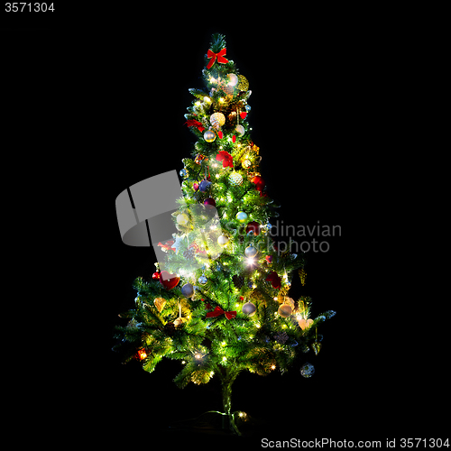 Image of beautiful decorated and illuminated christmas tree