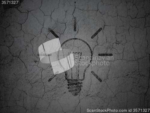 Image of Finance concept: Light Bulb on grunge wall background