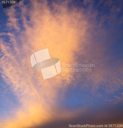 Image of sunrise in the colored sky white soft clouds and abstract backgr