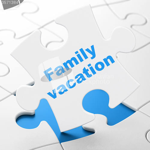 Image of Tourism concept: Family Vacation on puzzle background