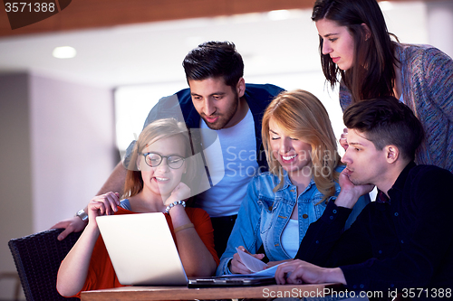 Image of students group working on school  project  together