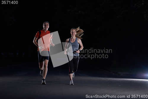 Image of couple jogging at early morning