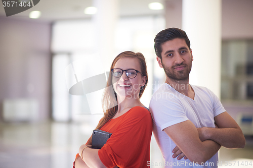 Image of students couple standing together