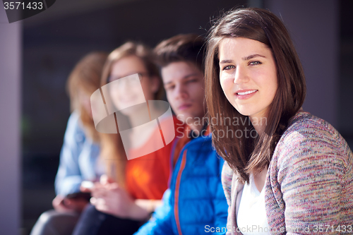 Image of students group working on school  project  together