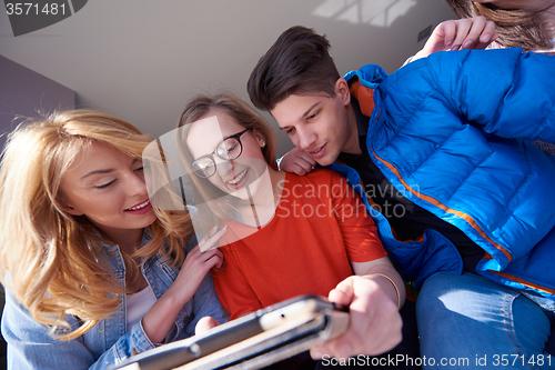 Image of students group working on school  project  together