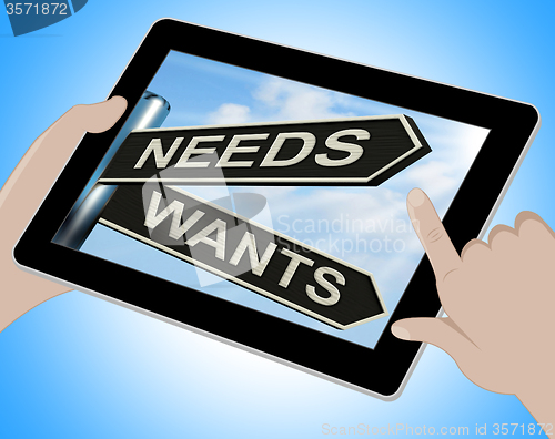 Image of Needs Wants Tablet Means Necessity And Desire