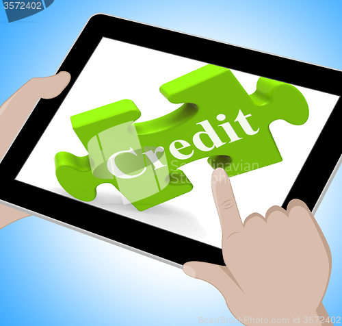 Image of Credit Tablet Shows Borrowing Cash Or Money
