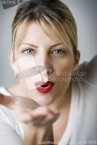 Image of blowing kiss